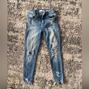 Signature Distressed Denim Skinny Jeans